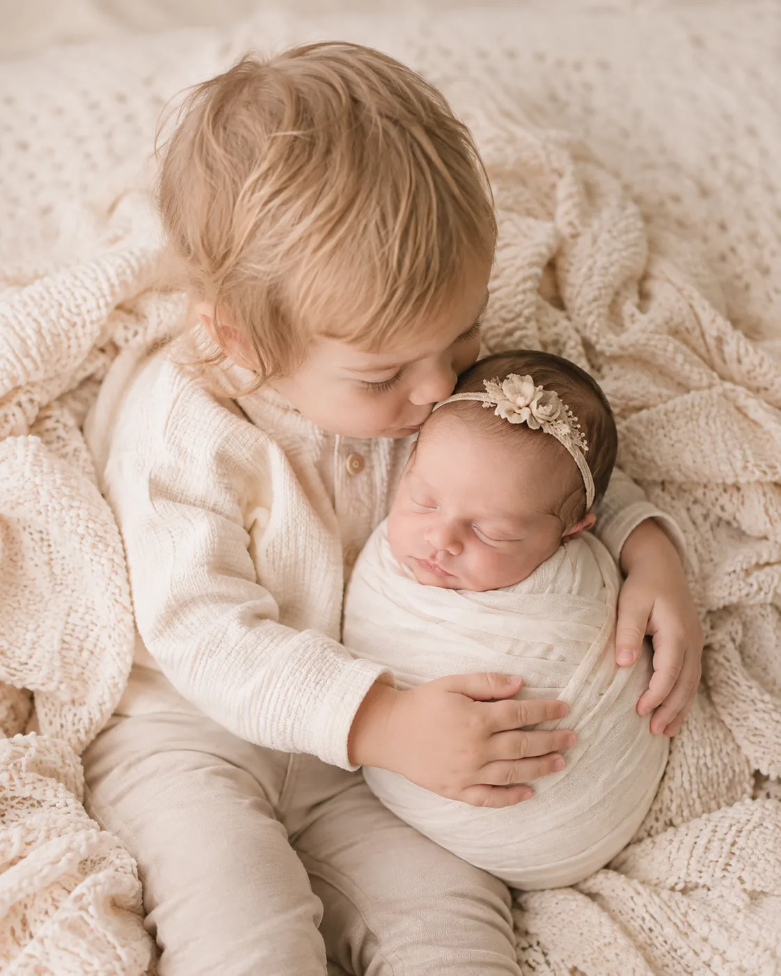 Toddler sibling and newborn baby together during a Raleigh sibling photography session